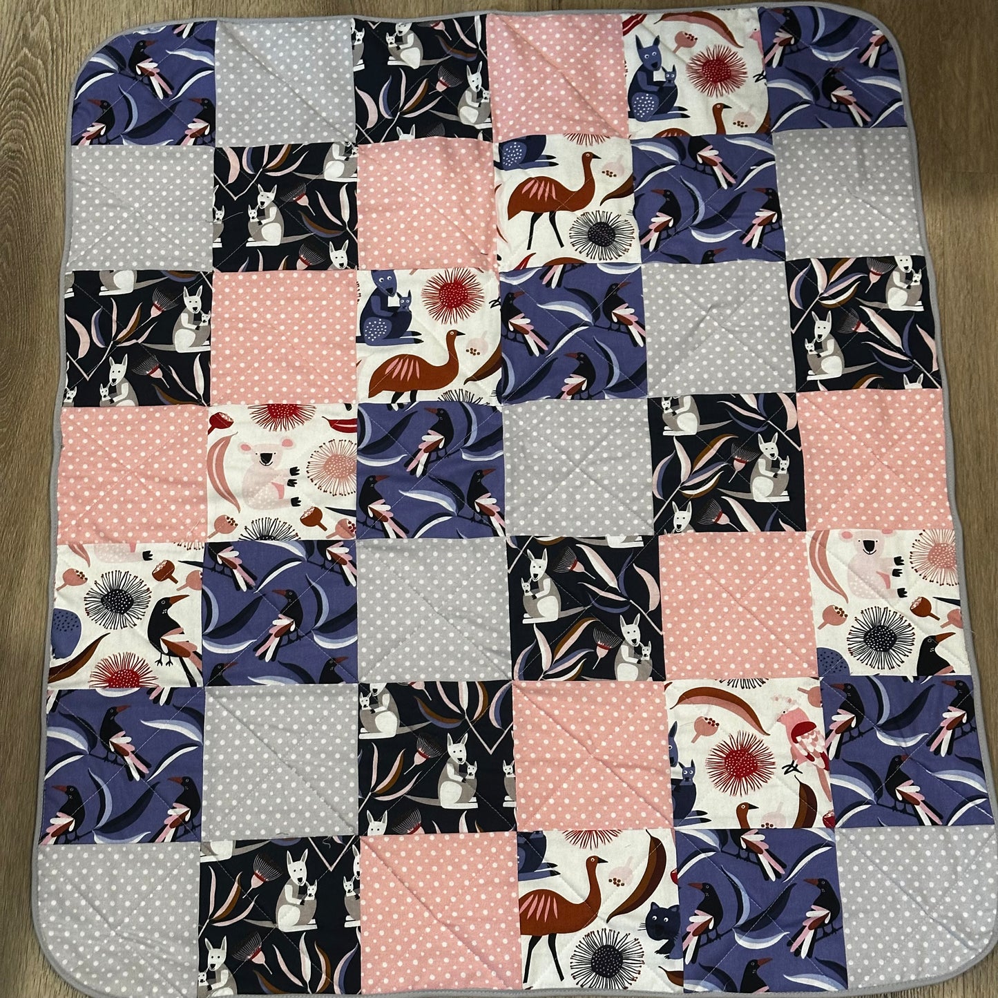 Patchwork baby quilt - purple floral