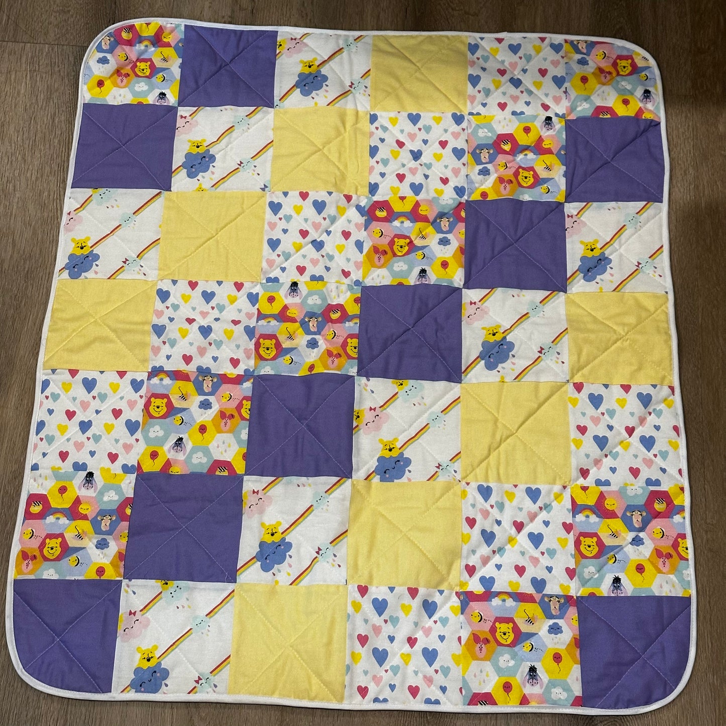Patchwork baby quilt - disney design