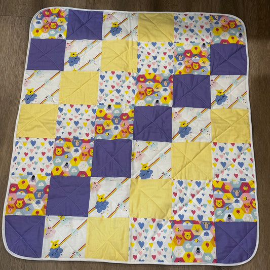 Patchwork baby quilt - disney design